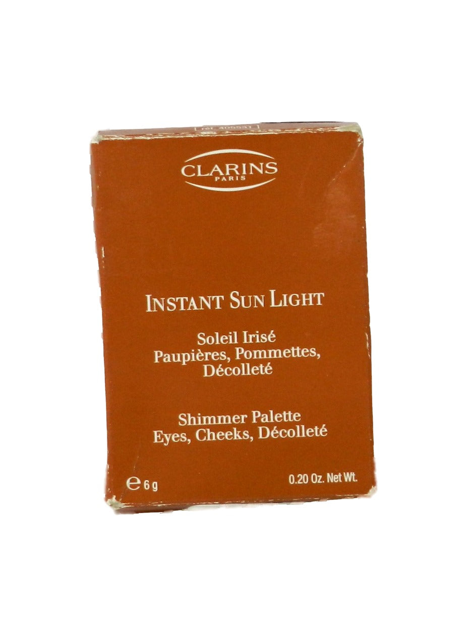 Clarins Instant Sun Light Shimmer Eyes, Cheeks, Decollete Palette 0.20 Ounces